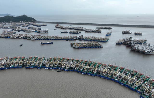 Fishing boats take shelter ahead of Typhoon Dolphin at a port in Wenling, east China