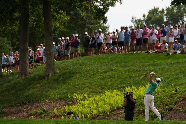 Rory McIlroy, of Northern Ireland, hits from the eighth tee
