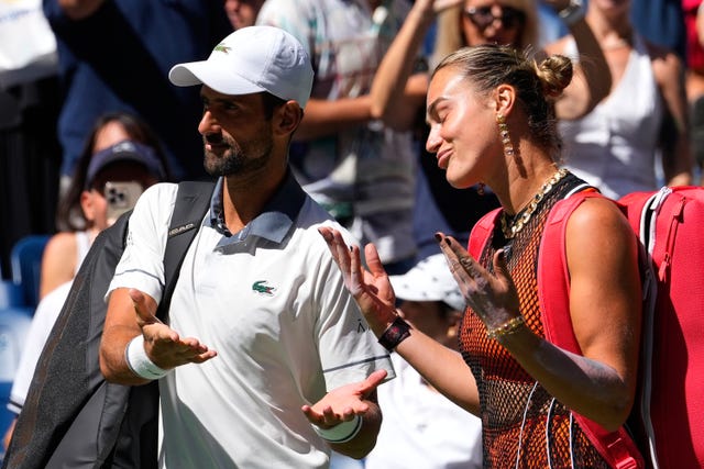 Novak Djokovic, left, and Aryna Sabalenka arrive on the court