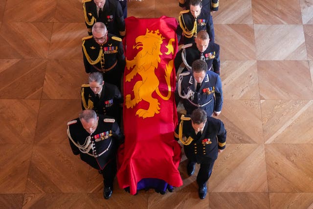 King Harald V’s coffin is moved by family and court staff