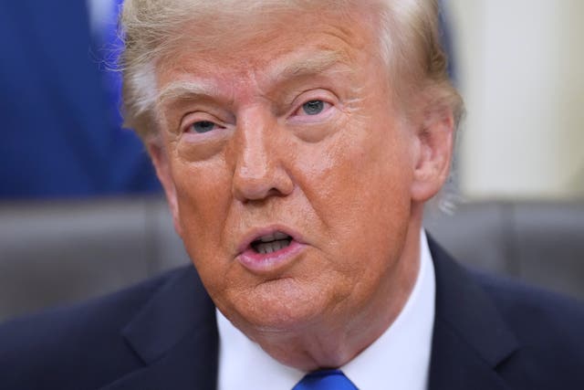 President Donald Trump speaks in the Oval Office