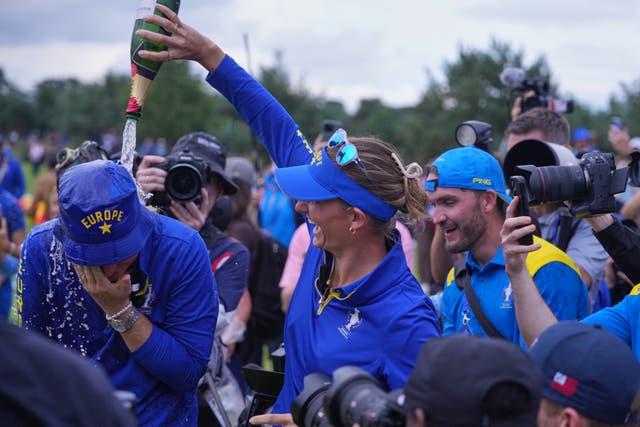 Members of Team Europe celebrate the win