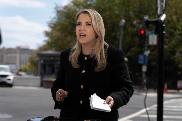 CNN senior White House reporter Betsy Klein reports near the White House complex after having her credential confiscated following President Donald Trump’s ban on CNN, MS NOW and Politico in Washington