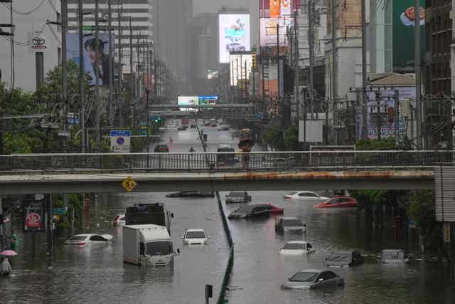 The streets are flooded after heavy rain in Bangkok