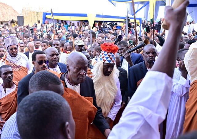 People arrive for the coronation ceremony of journalist Edward Rukidi Kijanangoma as king of Uganda’s traditional Tooro Kingdom