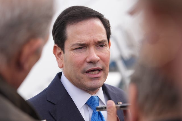 US secretary of state Marco Rubio speaks to the press before boarding a plane