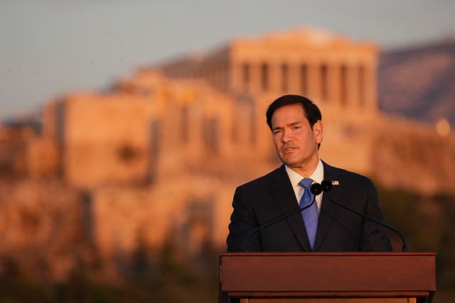 Marco Rubio giving an address, with the Acropolis in the background