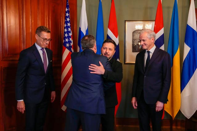 Ukrainian President Volodymyr Zelensky hugs US envoy Steve Witkoff