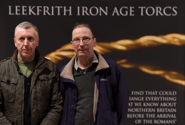 Metal detectorists Joe Kania, right, and Mark Hambleton discovered the collection of gold torcs 