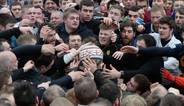 Players during the Royal Shrovetide Football match in Ashbourne, Derbyshire (Joe Giddens/PA)