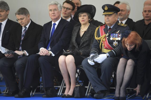 Secretary of State for Defence Michael Fallon (3rd left) Prime Minister Theresa May (centre) and Chief of the Defence Staff Air Chief Marshal Stuart Peach (2nd right) attend the unveiling of a new Iraq and Afghanistan memorial (Toby Melville/PA)