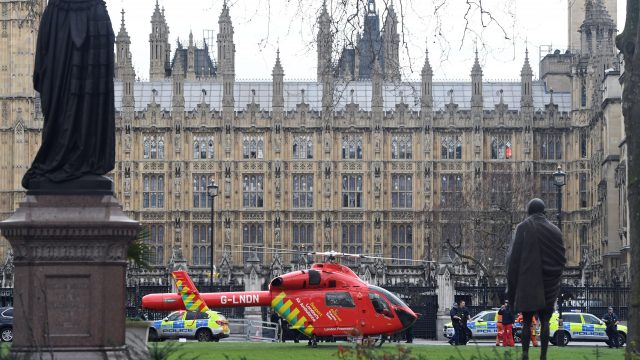 An air ambulance lands outside the Palace of Westminster (Victoria Jones/PA)