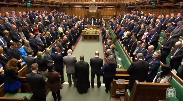 Members of the House of Parliament observe a minutes silence to pay respect to the victims of yesterday's terror attack in Westminster