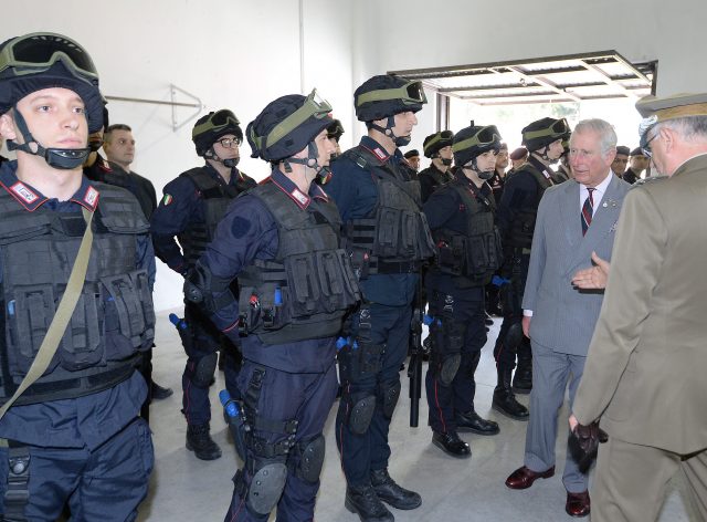 The Prince of Wales with officers and a special forces team after a training exercise