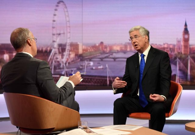 Sir Michael Fallon talks to presenter Eddie Mair (Jeff Overs/BBC/PA)