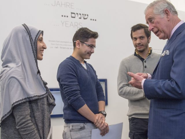 Charles meets refugees