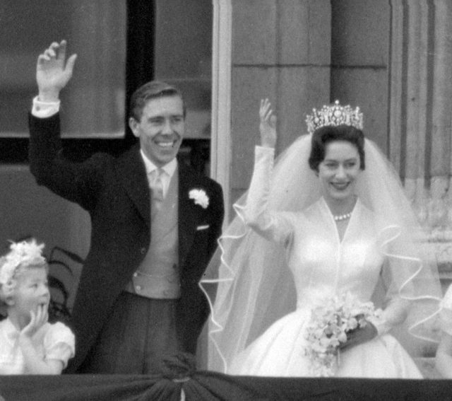 Princess Margaret and Lord Snowdon waving to the crowds on the balcony of Buckingham Palace after their wedding ceremony