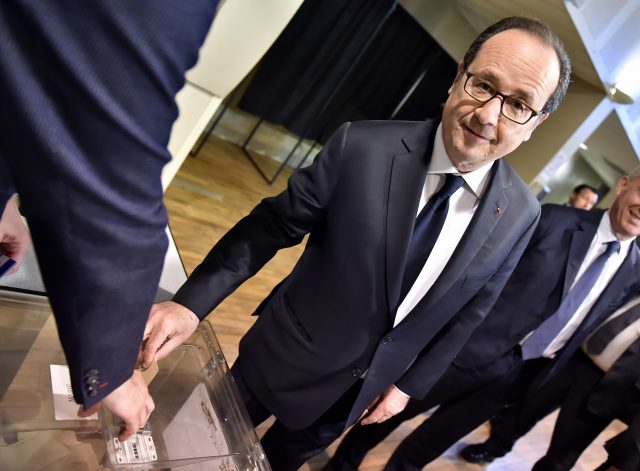 French president Francois Hollande casts his ballot in the first round of the presidential election in Tulle (Georges Gobet, Pool/AP)