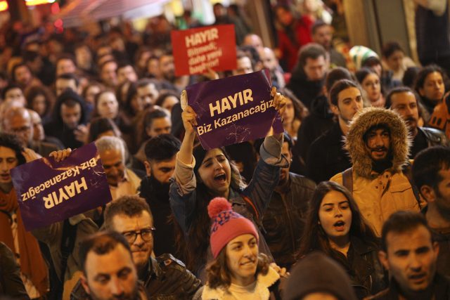 Supporters of the 'no' vote chant slogans  in Istanbul (Emrah Gurel/AP)