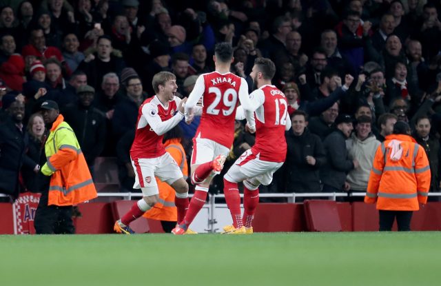 Monreal celebrates Huth's own goal (Steven Paston/PA)