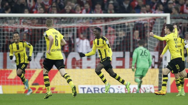 Dortmund's Ousmane Dembele celebrates after scoring his side's third goal (Matthias Schrader/AP)