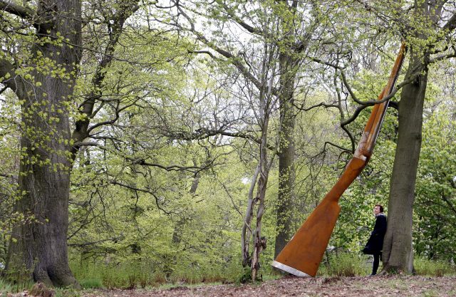 Artist Cornelia Parker with her work Landscape With Gun And Tree (Danny Lawson/PA)