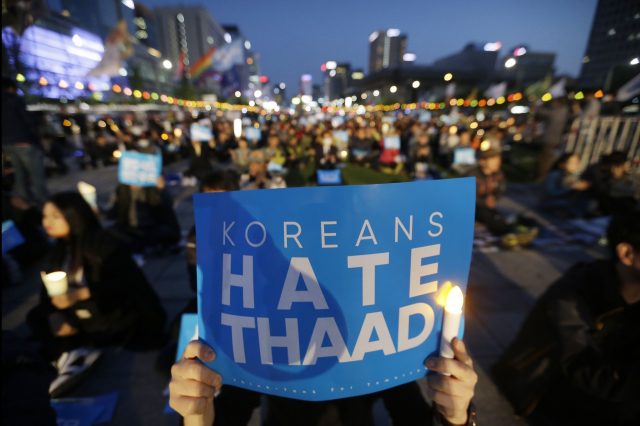 South Korean protesters stage a rally to oppose a plan to deploy the advanced U.S. missile defense system called Terminal High-Altitude Area Defense, or THAAD (Ahn Young-joon/AP)