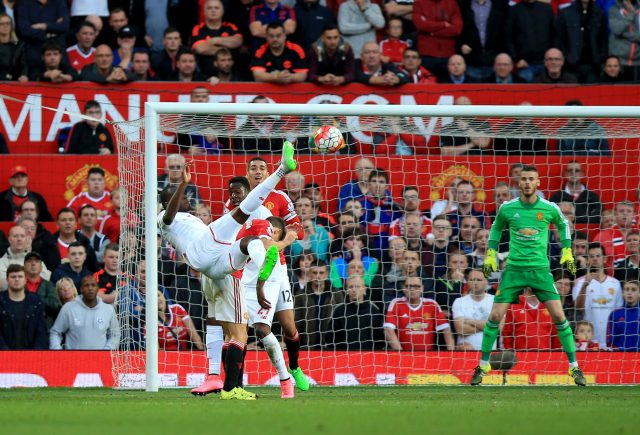Liverpool's Christian Benteke scores an overhead kick against Manchester United (Mike Egerton/EMPICS)