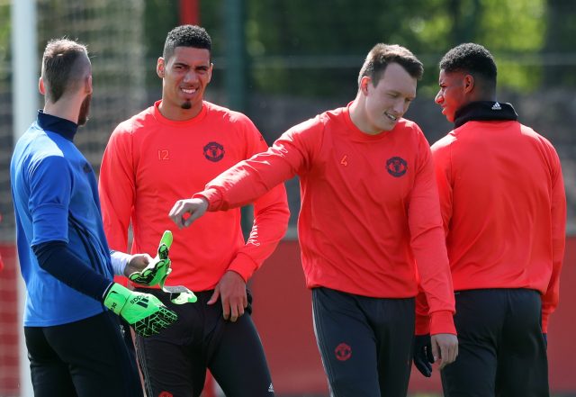 Chris Smalling (second left) and Phil Jones (second right)