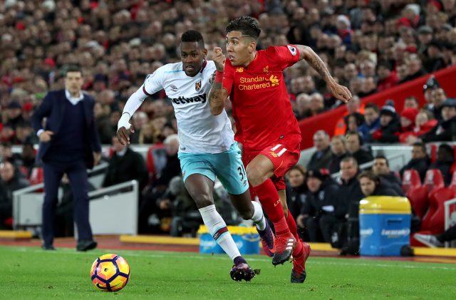 West Ham and Liverpool players battle for the ball
