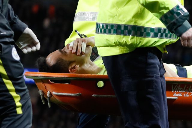 Claudio Bravo is stretchered off.