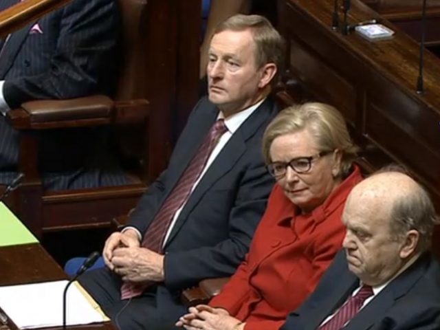 Taoiseach Enda Kenny listens to the speech (PA)