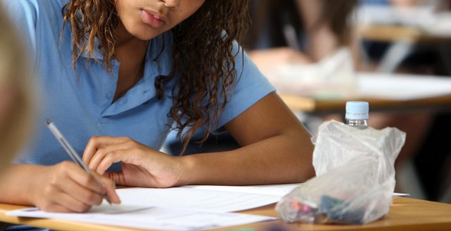A pupil sitting a GCSE English exam (Chris Radburn/PA)