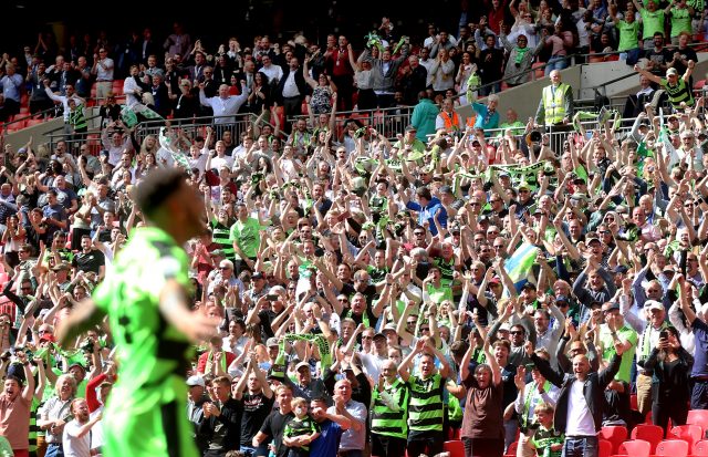 Forest Green Rovers' fans celebrate after Kaiyne Woolery scores their third goal (Scott Heavey/EMPICS)