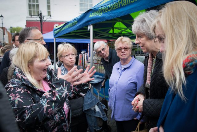 Prime Minister Theresa May meets Cathy Mohan at Abingdon market in Oxfordshire during an General Election campaign visit