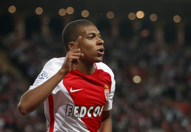 Kylian Mbappe celebrates his goal (Claude Paris/AP)