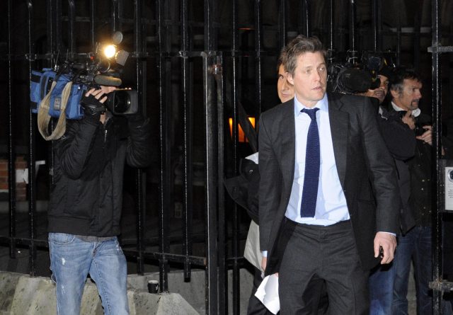 Grant leaves after giving evidence to the Leveson Inquiry in 2011 (Rebecca Naden/PA)