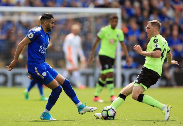 Riyad Mahrez, left, and AFC Bournemouth's Dan Gosling battle for the ball