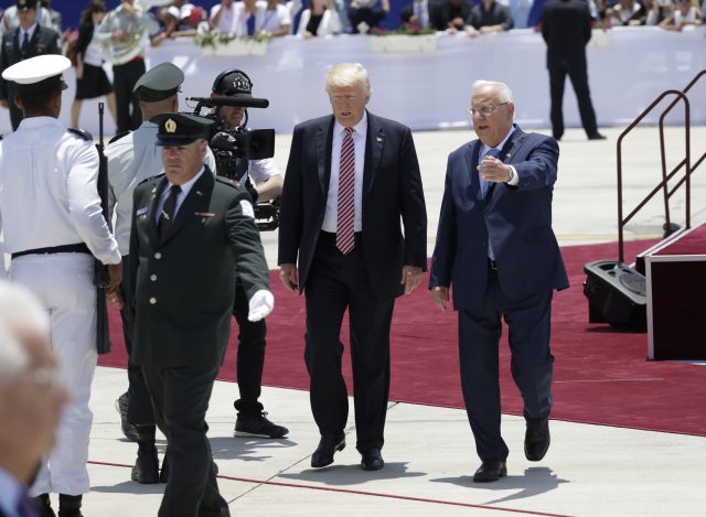 President Donald Trump, centre is welcomed by Israeli President Rueben Rivlin, on arrival ceremony at Ben Gurion International Airport (Evan Vucci/AP)