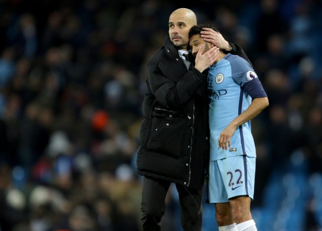 Pep Guardiola and Gael Clichy