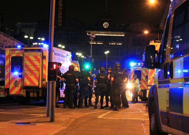 There was a heavy police presence outside the scene (Peter Byrne/PA)