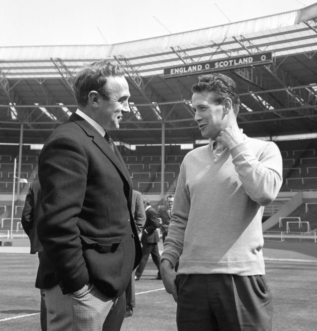 Willie Wallace, right, seen chatting to former England captain Billy Wright, netted twice on his European debut