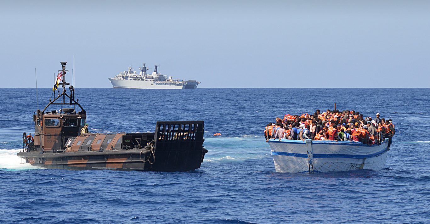 Italy Coast Guard Says At Least 20 Dead In Migrant Capsizing | Express ...