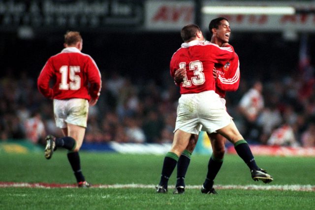 Jeremy Guscott celebrates after his drop goal