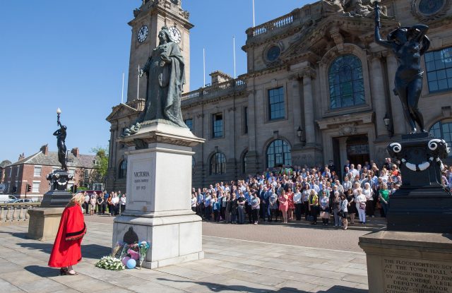 Mayor Olive Punchion laying flowers outside South Shields town hall (Tom White/PA)