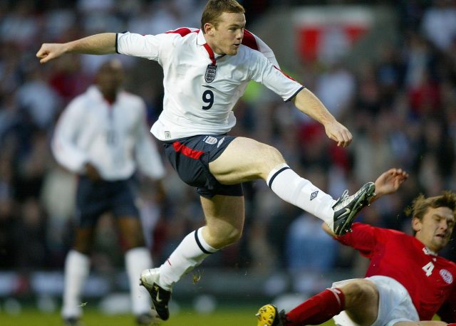 Wayne Rooney hits a fine goal against Denmark (Martin Rickett/PA)