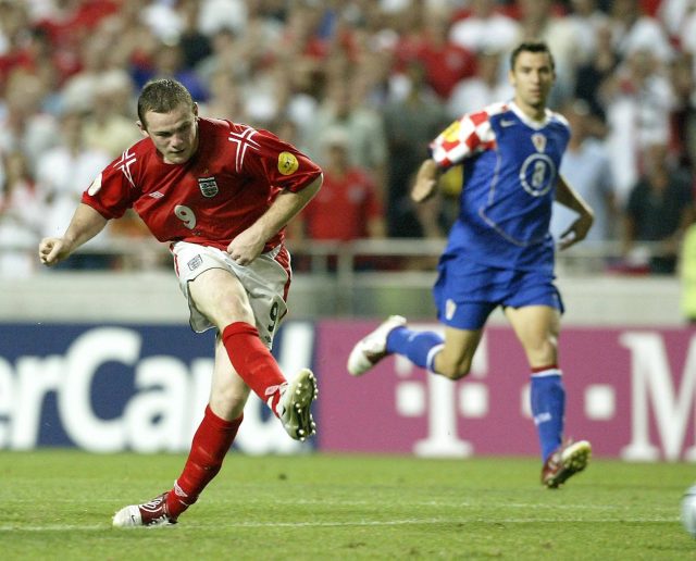 Wayne Rooney scores with a long-range effort