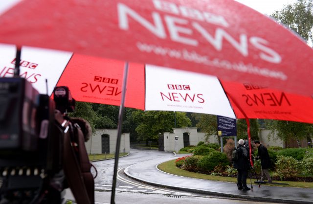 A BBC umbrella outside the Charters Estate in Sunningdale, Berkshire, where Sir Cliff Richard has an apartment