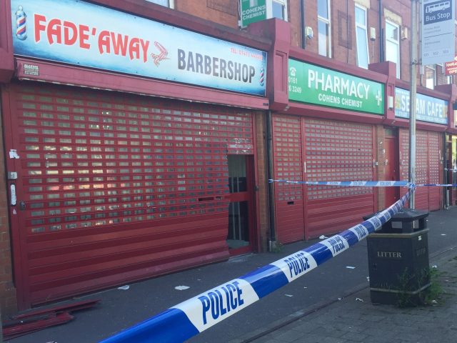 Police cordon in Moss Side (Kim Pilling/PA)