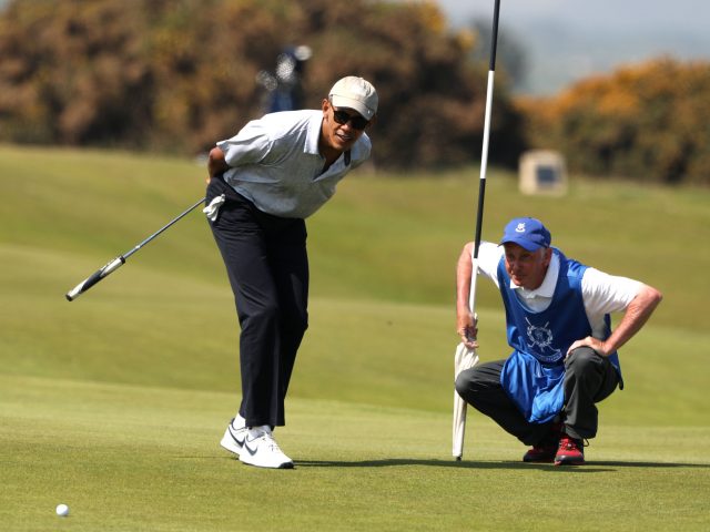 Mr Obama keeps a close eye on his ball (Andrew Milligan/PA)